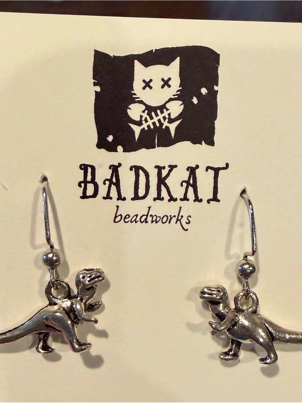 BADKAT Beadworks Silver Dinosaur Drop Earrings